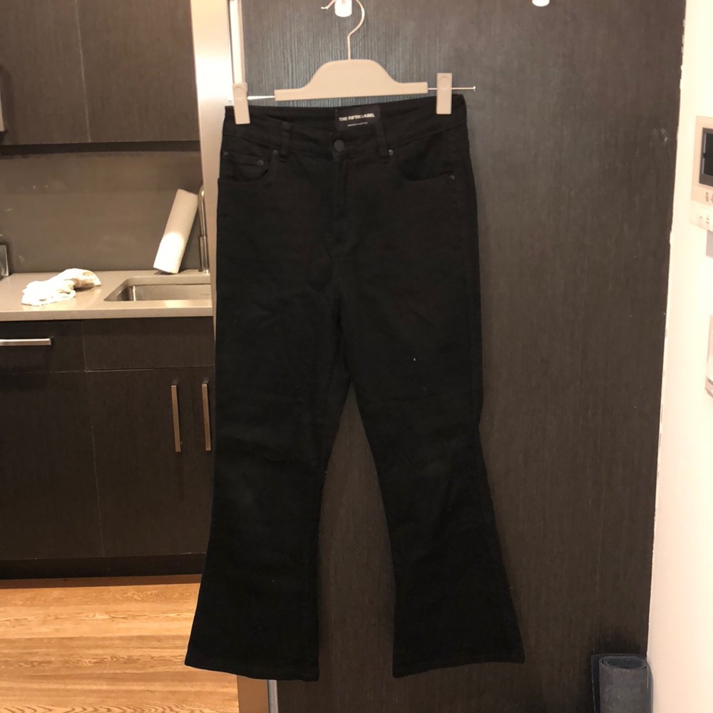 Black mid-rise Jean with flare at ankle